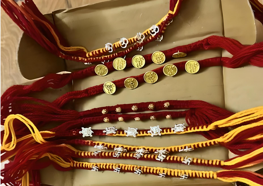 Set of 10 Designer Religious Rakhis – Ganesha, Om, Tortoise, Coin & Dora Rakhis with Roli Chawal & Greeting Card